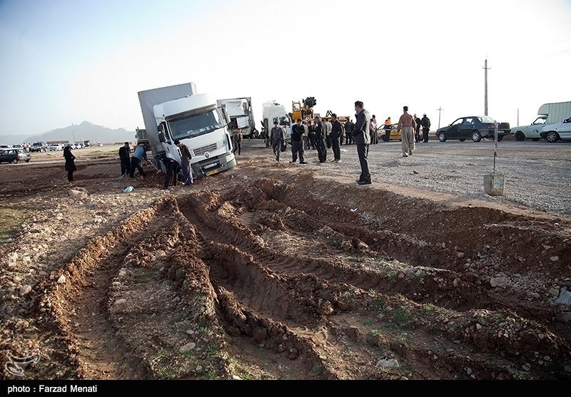 Four trucks collide in western Iran - IN PHOTOS