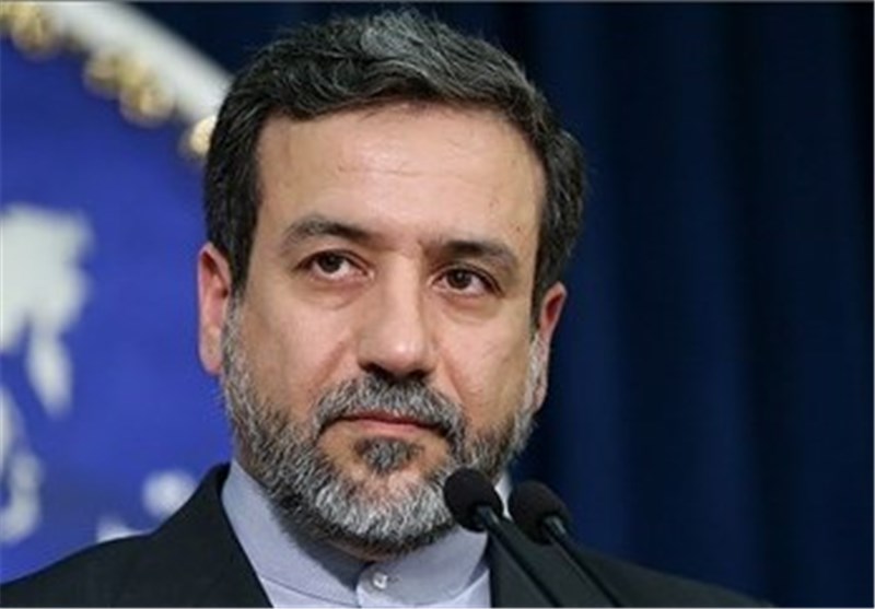 بازدید عراقچی از نمایشگاه عکس عاشوراییان