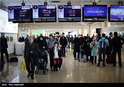 مسافران نوروزی در فرودگاه هاشمی‌نژاد مشهد