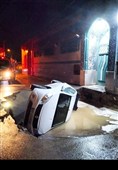 فرونشست زمین در خمینیشهر؛ سقوط خودرو ال90 در گودال