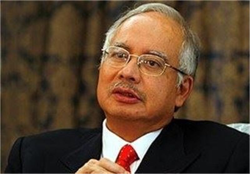 Malaysia&apos;s Ex-PM, Ex-Treasury, Spy Chiefs Charged with Graft