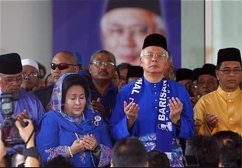 Defeated Malaysian Leader, Wife Barred from Leaving Country