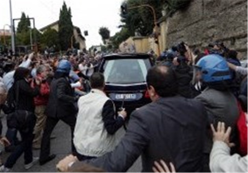 Italian Protesters Take on Police during Mass March against Austerity Budget