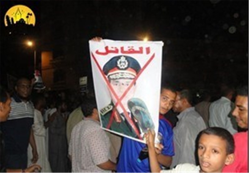 هواداران مرسی در دانشگاه الازهر تصاویر السیسی را آتش زدند