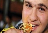 تبریک استاندار مازندران به مولایی و براری در مسابقات جهانی وزنه برداری