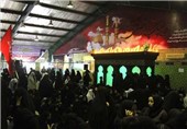 برافراشتن پرچم حرم رضوی در خیمه‌گاه ابوالفضل(ع) بوشهر