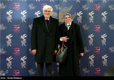 محمدرضا عارف و همسرش در حاشیه جشنواره فیلم فجر-برج میلاد
