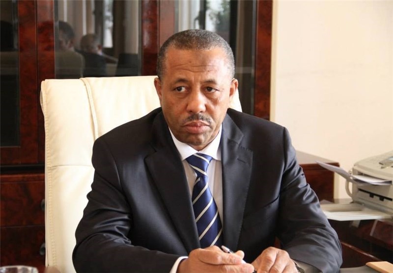 عبد الله الثنی وزیر الدفاع اللیبی یتولى إدارة البلاد مؤقتا بعد إقالة على زیدان