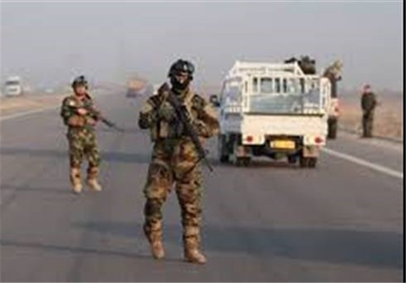 ارتش عراق 9 داعشی ملبس به لباس زنانه را در سامراء دستگیر کرد