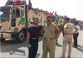 نیروهای امنیتی و مردمی عراق روی نوار پیروزی
