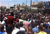 هزاران نفر با تشییع پیکر نوجوان فلسطینی شعار انتقام سر دادند+تصاویر