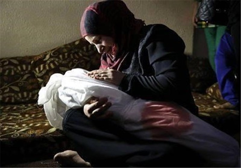 مادر فلسطینی با کودک شهیدش چه می‌گوید+عکس