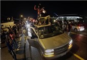 پلیس آمریکا با 200 معترض در فرگوسن درگیر شد + عکس