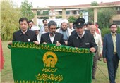پرچم متبرک حرم رضوی به گلزار شهدای گمنام دانشگاه پزشکی گلستان اهدا شد