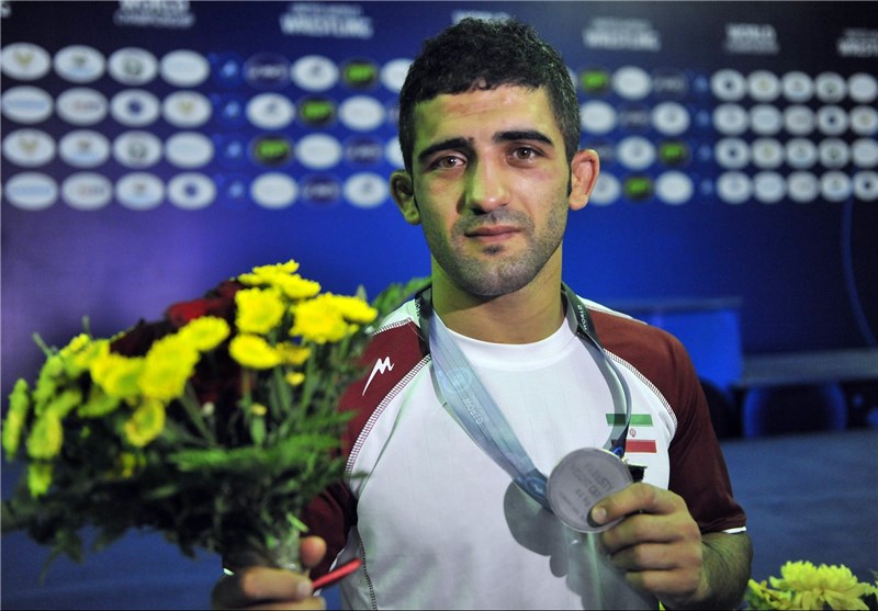 Iran&apos;s Wrestler Masoud Esmaeilpour Wins Gold in Asiad