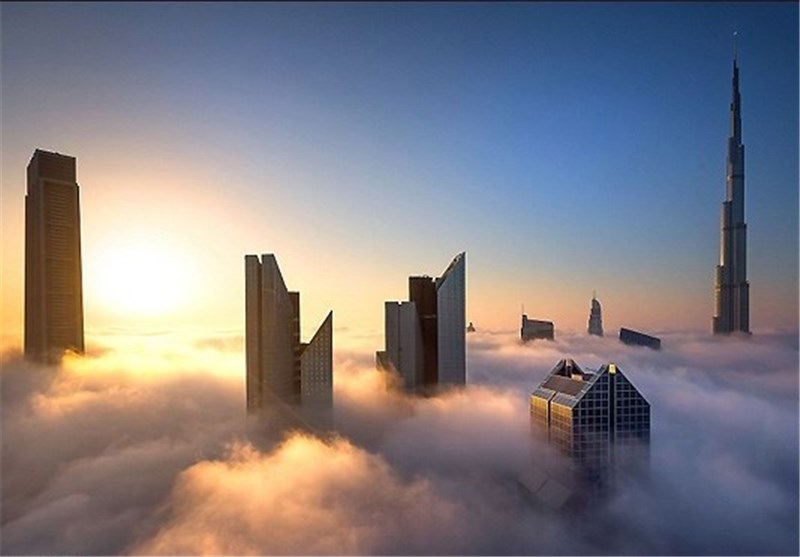 تصاویر بلندترین برج جهان در میان توده غلیظ مه‎
