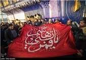 اهتزاز پرچم حرم حضرت ابوالفضل(ع) در برج میلاد