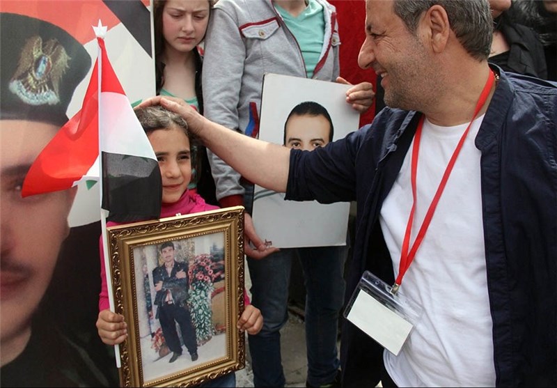 یاد و خاطره شهدای ایران در بین زائران صلح سوریه زنده شد