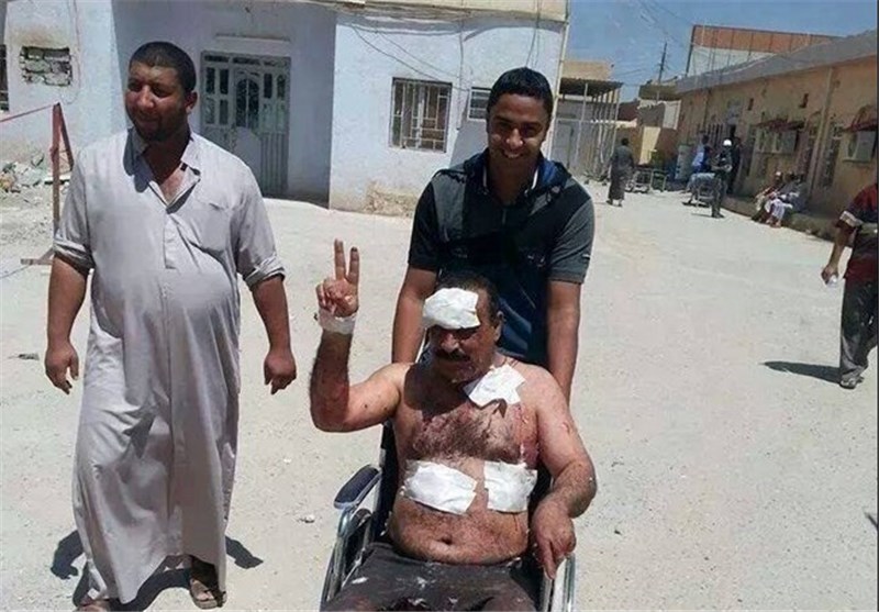 قربانی حملات تروریستی عراق با ویلچر و بدنی زخمی در انتخابات شرکت کرد+ تصویر