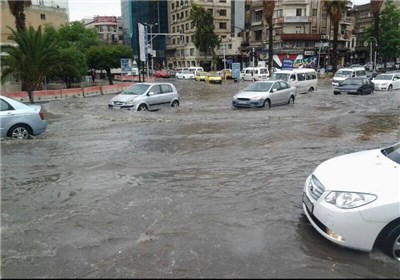شوارع مدینة دمشق تنعم بخیرات السماء