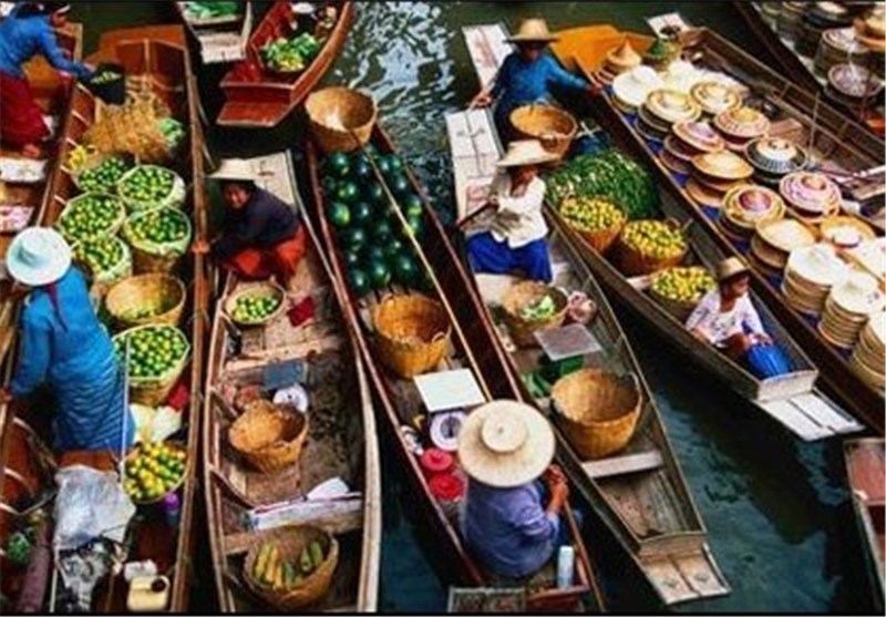 تصاویر بازاری روی آب در تایلند