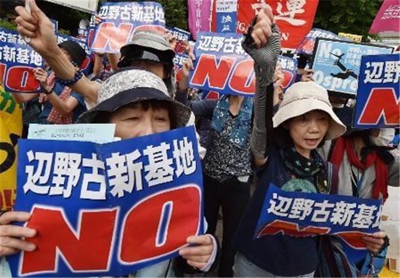 Thousands Surround Japan&apos;s Parliament, Protesting New US Airbase Plan on Okinawa