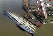 تصاویر بازگرداندن کشتی غرق شده چین