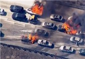 Motorists Flee as Wildfire Races across California Freeway