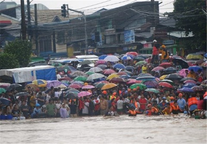 Four Dead, Thousands Flee as Floods Hit Northern Philippines