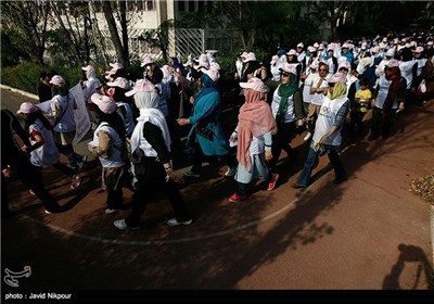 Iranian Women Attend Public Running Event in Tehran