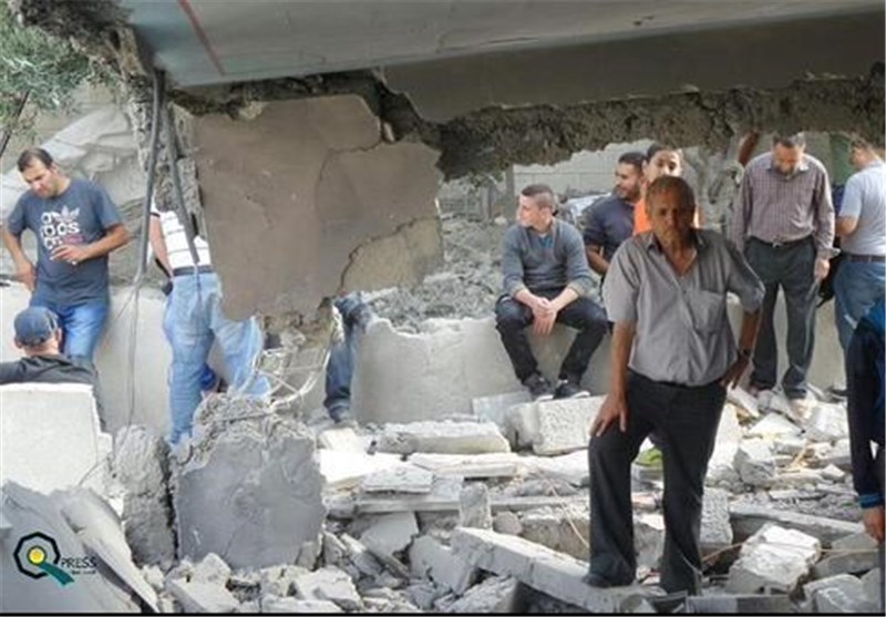 Palestinian Homes in East Al-Quds Razed by Zionist Regime