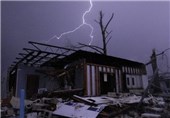 Tornadoes, Flash Floods Kill At Least 43 in US