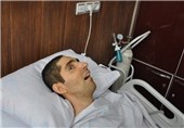 وزیر بهداشت با شهید زنده لرستانی دیدار کرد