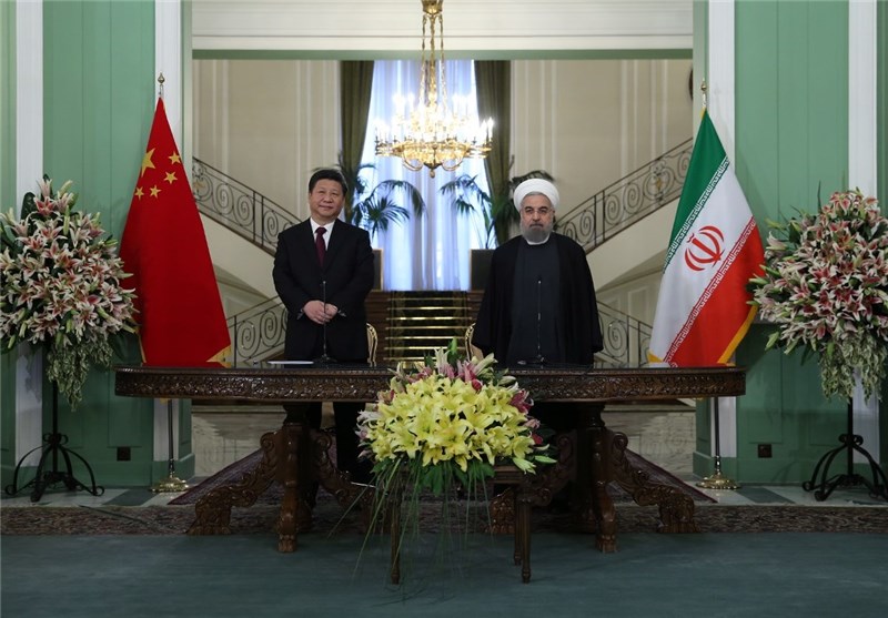 روحانی: گسترش روابط تجاری ایران و چین به 600میلیارد دلار تا 10 سال آینده/ پینگ: چین جایگاه بزرگ‌ترین شریک تجاری ایران را دارد