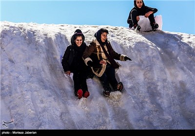 Iranian People Enjoying Winter in Snowy Mountains