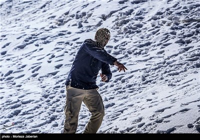 Iranian People Enjoying Winter in Snowy Mountains