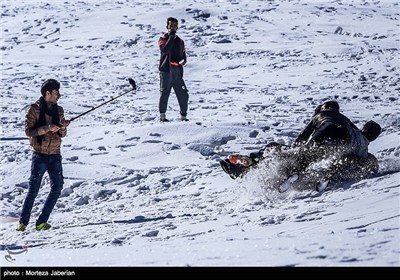 Iranian People Enjoying Winter in Snowy Mountains