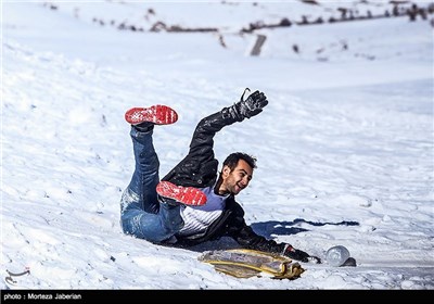 Iranian People Enjoying Winter in Snowy Mountains