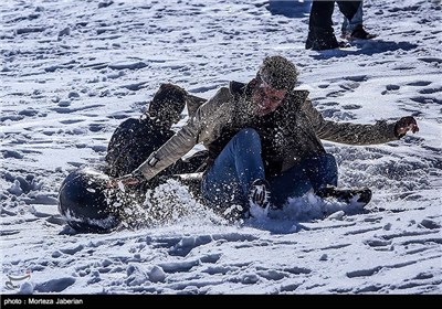 Iranian People Enjoying Winter in Snowy Mountains