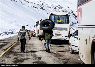 Iranian People Enjoying Winter in Snowy Mountains