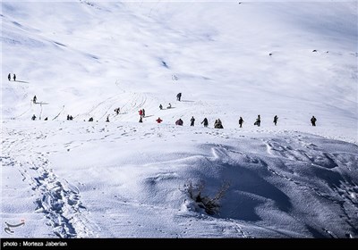 Iranian People Enjoying Winter in Snowy Mountains