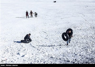 Iranian People Enjoying Winter in Snowy Mountains