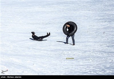 Iranian People Enjoying Winter in Snowy Mountains