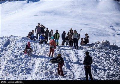 Iranian People Enjoying Winter in Snowy Mountains