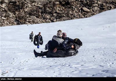 Iranian People Enjoying Winter in Snowy Mountains