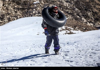 Iranian People Enjoying Winter in Snowy Mountains