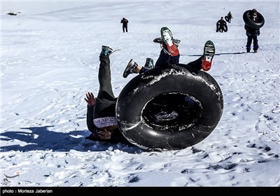 Iranian People Enjoying Winter in Snowy Mountains