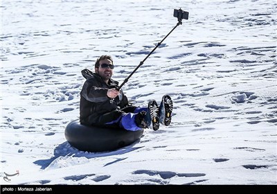 Iranian People Enjoying Winter in Snowy Mountains