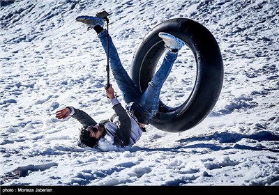 Iranian People Enjoying Winter in Snowy Mountains