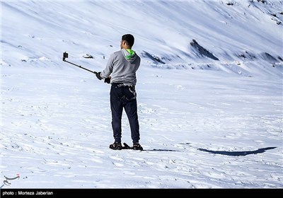 Iranian People Enjoying Winter in Snowy Mountains